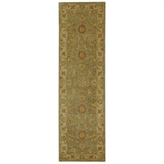 Antiquity Oval Floral Bordered Hand-Tufted Wool Rug